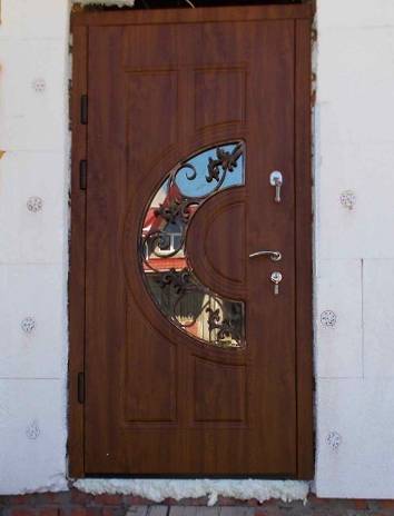 Дверь с ковкой и стеклопакетом Дверь с ковкой и стеклопакетом